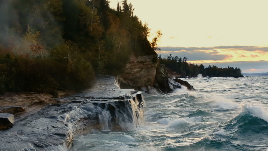 Looping video features waves crashing hard on the rocky Lake Superior Coast of Upper Peninsula Michigan near Pictured Rocks National Lakeshore and the communities of Munising and Christmas.