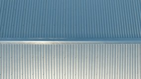 metal roof of an industrial building. Aerial video verical. The drone moves away
About industry, modern, textures - Powered by Shutterstock - Get 15% off with code: PIKWIZARD15