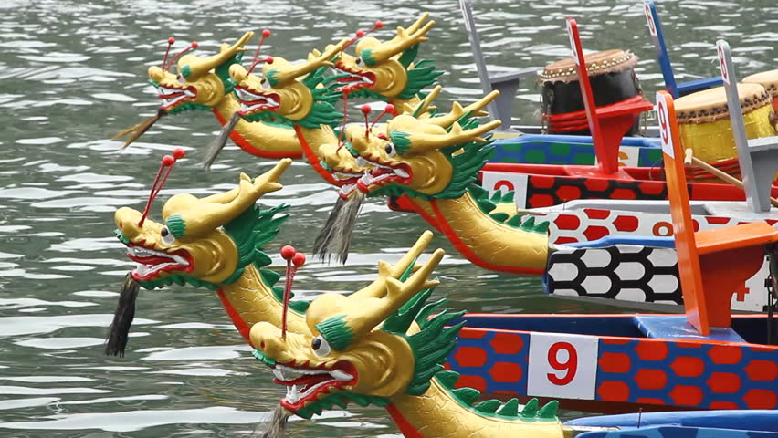 dragon boat is a human-powered boat traditionally made of teak wood to various