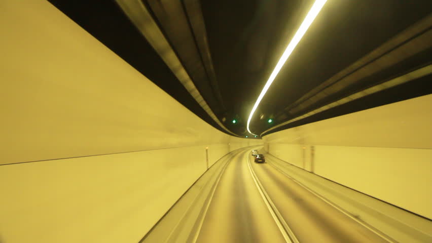 car driving fast in tunnel