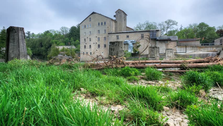 With a waterfall thundering in the foreground, we move to get a view of an old building