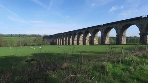 Aerial shot of Viaduct with Train, UK