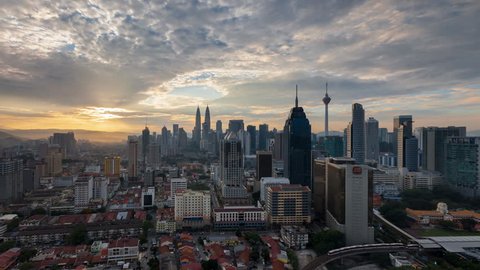 Time lapse: Kuala Lumpur city view during dawn overlooking the city skyline