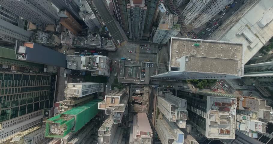 Top view aerial footage from flying drone of metropolitan city HongKong with development buildings, transportation, energy power infrastructure. Financial and business centers in developed China town. Royalty-Free Stock Footage #24089902