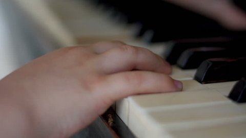 Playing the piano, close-up