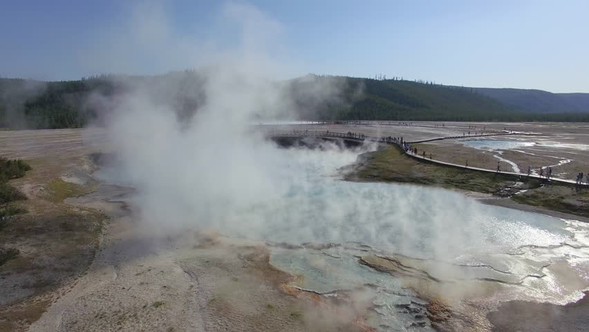 Steam billows off of a hot spring in Yellowstone National Park