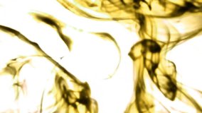 Random patterns of ink in water in yellow and black