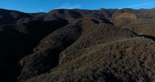 Aerial Drone Climbing Castaic Lake Wilderness foothills in 4k 24 fps	