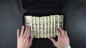 Top View of Money Bag. Man Counts the Cash in a Suitcase. 4K Ultra HD 3840x2160 Video Clip