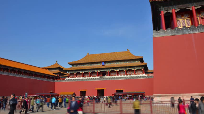 Hyperlapse red wall. Forbidden city Beijing capital of China. Emperor palace. Old Asian culture. Beautiful summer day, Blue sky. Cinematic 4K.