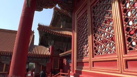 Forbidden city Beijing capital of China. Emperor palace red internal garden. Old Asian culture. Beautiful summer day, Blue sky. Cinematic