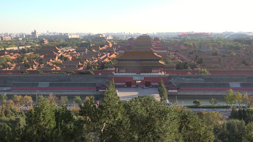 Sunset wide angle aerial view of Forbidden city Beijing capital of China. Emperor palace. Old Asian culture. Beautiful summer. Cinematic 4K. Zoom