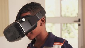 Happy black family at home. African american father, mother and child. Hispanic dad, mom and son playing with virtual reality goggles, VR headset, modern technology glasses
 - Powered by Shutterstock - Get 15% off with code: PIKWIZARD15
