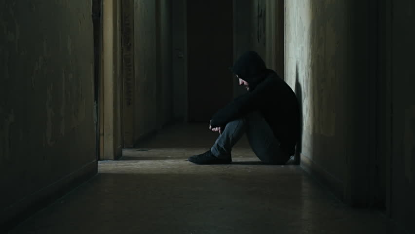 .Following a hooded young man inside a dark derelict ghetto building.A hooded young man facing social issues,walking inside a big apartment building in the projects in 100fps slow motion.Camera gimbal | Shutterstock HD Video #24137350
