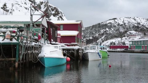 QUIDI VIDI, NEWFOUNDLAND AND LABRADOR, CANADA - FEBRUARY 18, 2017.  Fishing boats at the dock during winter months.