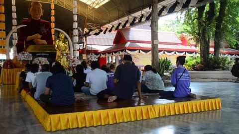 SINGBURI, THAILAND - FEBRUARY 9 : Thai people praying with Somdet Phra Buddhacarya or To Brahmaramsi buddha statue at Wat Phra Non Chakkrasi Worawihan on February 9, 2017 in Sing Buri , Thailand.