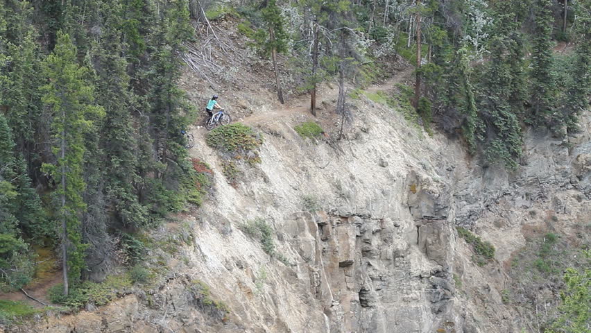 Bike riders on famous Yukon River loop trail recreation area of Schwatka Lake