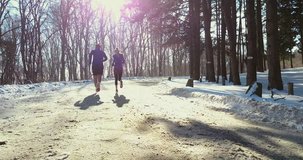 couple winter running  in snow