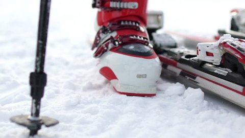 Fixing the ski boot. Skiing close up.