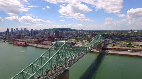 Montreal aerial view, Jacques Cartier bridge over the Saint Lawrence river in Quebec, Canada.