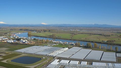 Portland Aerial Sauvie Island v54 Flying over large nursery panning down.
