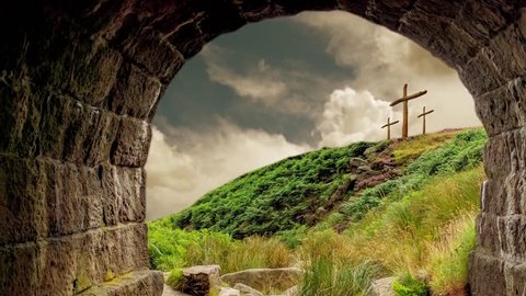 Three wooden crosses on a hill seen from the empty grave. Easter Resurrection Background.