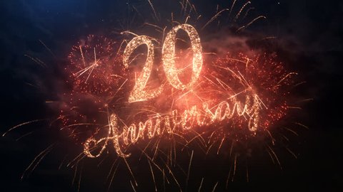 Happy birthday Anniversary 20 years celebration greeting text with particles and sparks on black night sky with colored slow motion fireworks on background, beautiful typography magic design.