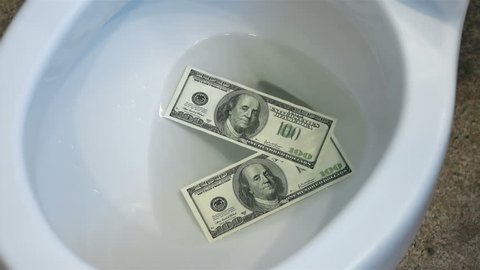 High quality video of flushing dollars in toilet bowl in real 1080p slow motion 120fps
