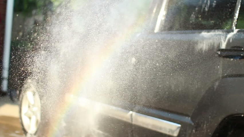 Washing a car.