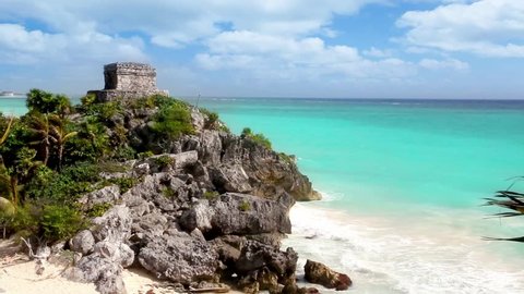 Ancient Tulum Mayan ruins over turquoise Caribbean sea