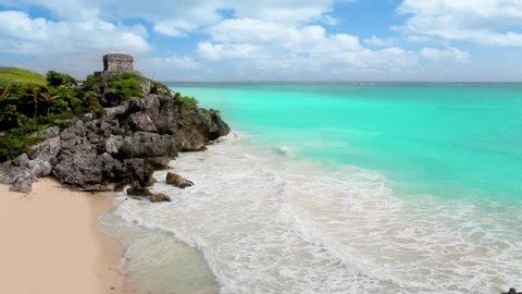 Tulim ancient Mayan ruins over the turquoise Caribbean sea of Mexico