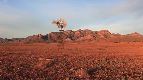 A windmill turns in outback Australia. This windmill is located in the Flinders Ranges National Park a few hours drive north of Adelaide, South Australia.