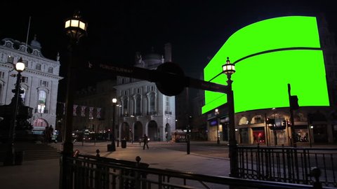Piccadilly Circus at night WS with green screens