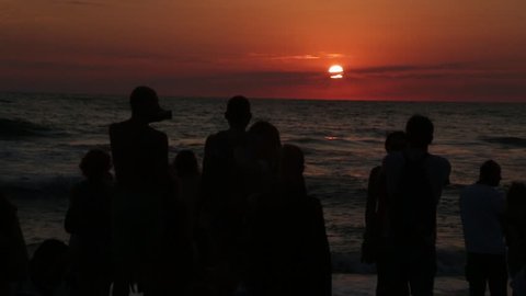 ANAKLIA, GEORGIA - AUGUST 20, 2016. People at sunset on the seashore