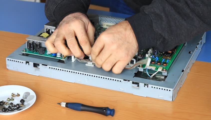 Technician fixes the cables
