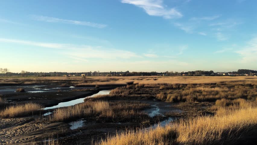 Tilt view of sunset on Ria de Aveiro, Ovar, Portugal.