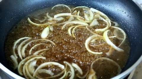 frying onion for make  sauce  katsudon , Japanese  food