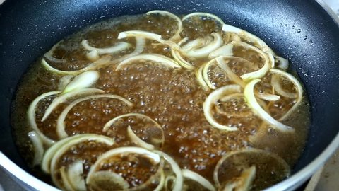 frying pork and vegetable to make katsudon , Japanese food