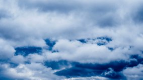 4096x2304 4K time lapse motion video of dark blue, gray and black clouds fast moving, passing, floating, flying dramatic cloudy sky before night, beautiful rain weather nature cloudscape background