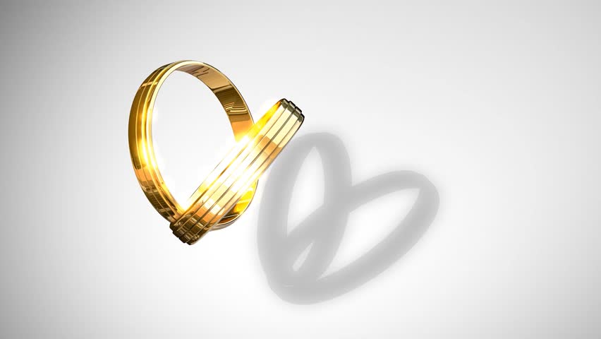 Wedding rings animtion forming heart shaped shades.
