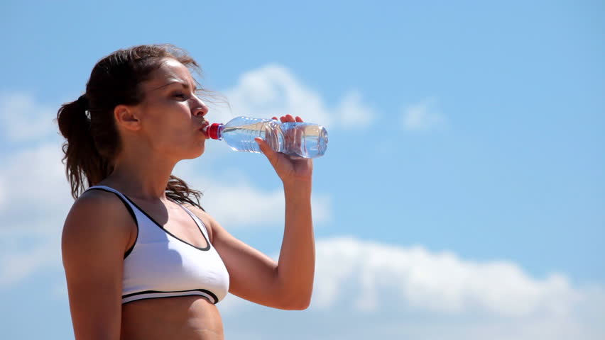 Video Stok woman drinks water (100% Tanpa Royalti) 2422520 Shutterstock.