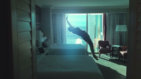 Two high quality videos of man jumping on the bed in real 1080p slow motion 250fps