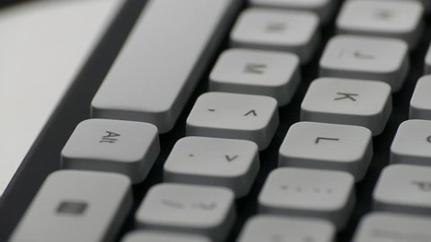 Ungraded: Rotating English PC keyboard around keys with letters and punctuation marks. Source: Lumix DMC, ungraded H.264 from camera without re-encoding. (av35542u)