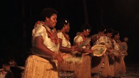 Fijian women dancing a traditional female dance Meke the fan dance. Real people. Copy space