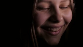 Closeup of cute teen girl smiling and laughing. 4K UHD native video