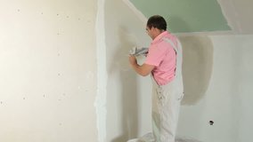 Applying plaster to new plasterboard wall, sequence