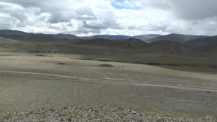 mound and archaeologists