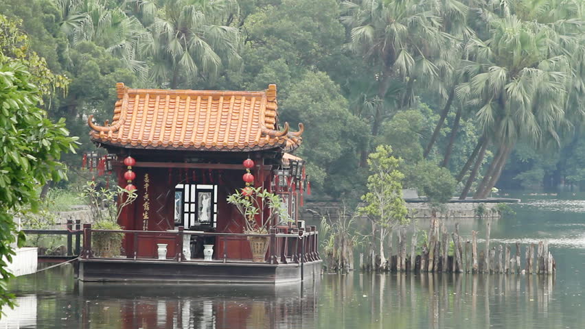 Traditional Chinese wooden hut in a lake - Guangzhou(Canton), Guangdong