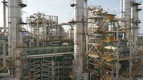 Oil and chemical petroleum industrial plant , smooth panning video scene of process area in day time 