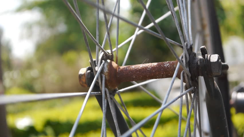 Bicycle wheel rotating close up